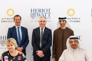 Image shows the key participants at the signing of the MOU in the UAE.